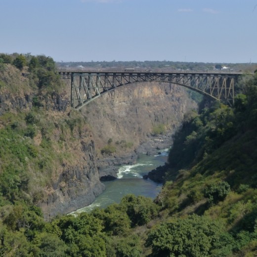 Victoria falls bridge leads across the border to Zimbabwe.