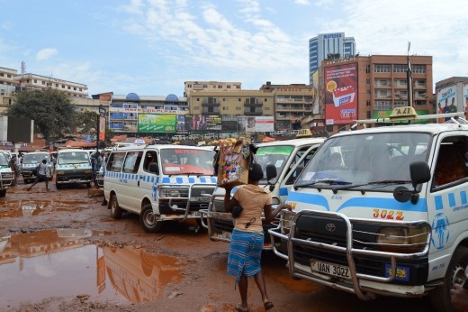 The taxi park in Kampala is chaotic but we eventually found the Entebbe matatu.