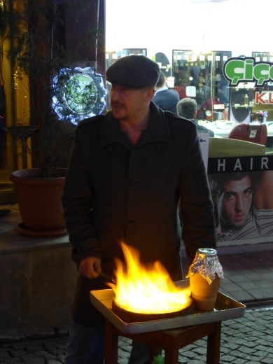 The Turkish Robert De Niro puts on a show with the kebab testi.