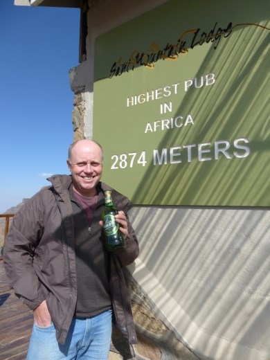 Having a Lesotho beer at the highest pub in Africa.