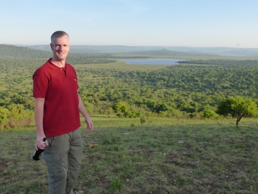 Dave enjoying the view and a sunset beer at Kazumu look out. 