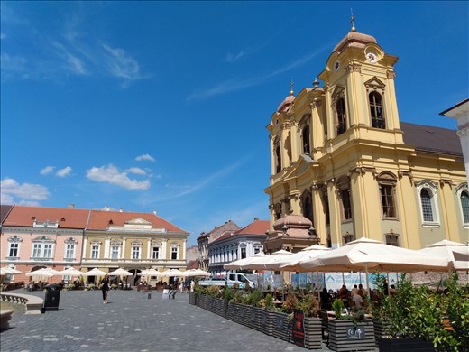 The Roman Catholic church dominates one side of Piata Unarii.