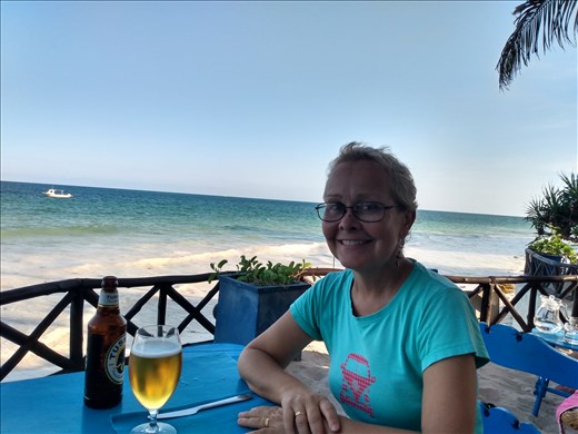 Cheers, Enjoying a cold Tusker on Danai Beach.