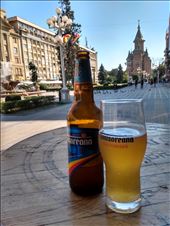 Enjoying the local brew, Timisoreana on Piata Victoriei.: by steve_and_emma, Views[200]