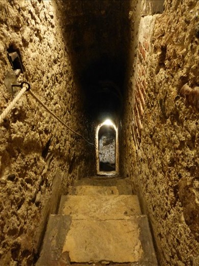 Down into the depths of the castle.