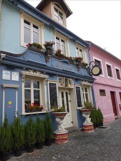 There are colourful buildings all over Sibiu, many of them cafes and restaurants.