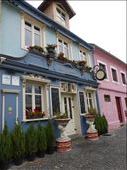 There are colourful buildings all over Sibiu, many of them cafes and restaurants.: by steve_and_emma, Views[201]