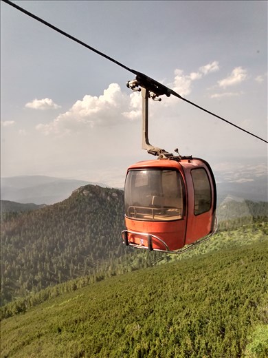 Getting the cable car down after a wonderful trek.