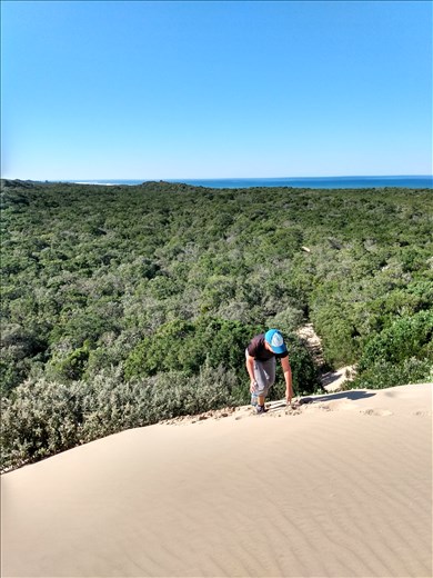 Climbing the dunes on the Cannon Rocks trail.
