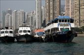Boats moored up on the waterfront with high rises in the background: by stevegarner, Views[159]