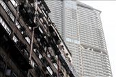 Contrast of the old public housing with a shiny new highrise at the rear: by stevegarner, Views[217]