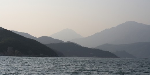 Murky hills showcase the high amounts of pollution in Hong Kong.