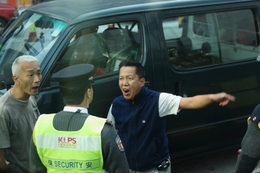 2 men having an altercation before the police intervene.