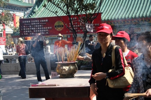 The Chinese burn inscense sticks in temples like this as they believe the smoke sends good wishes up to the spirit world.