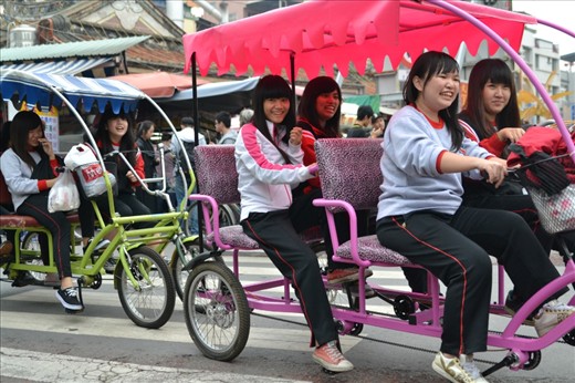 This photo shows a typical free time activity possibly carried by the students in Taiwan. As bikes are present in all around Taiwan, Taiwanese students or even tourists loves to rent bikes to move around or explore places in Taiwan.