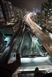 Buildings as far as the eye can see. We find ourselves gazing into the endless abyss. Light pours through the streets like a river through the concrete jungle.: by stuartdavis, Views[403]