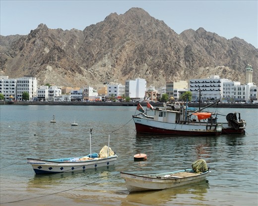 Muscat Fishing Harbour - The Dhows & Skiffs lay in wait after the mornings catch goes to sale