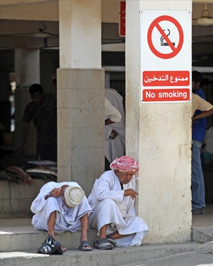 Muscat Fishing Harbour - Omani fishermen take a break after a busy mornings fishing