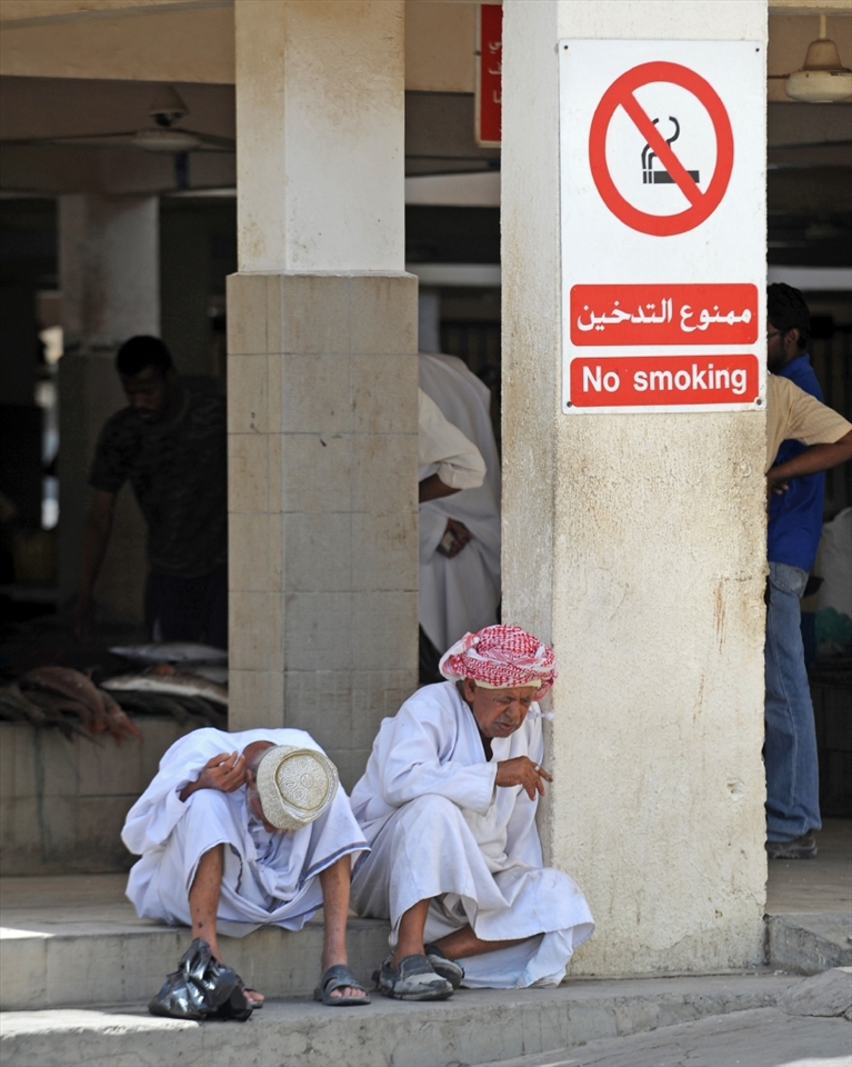 Muscat Fishing Harbour - Omani fishermen take a break after a busy mornings fishing