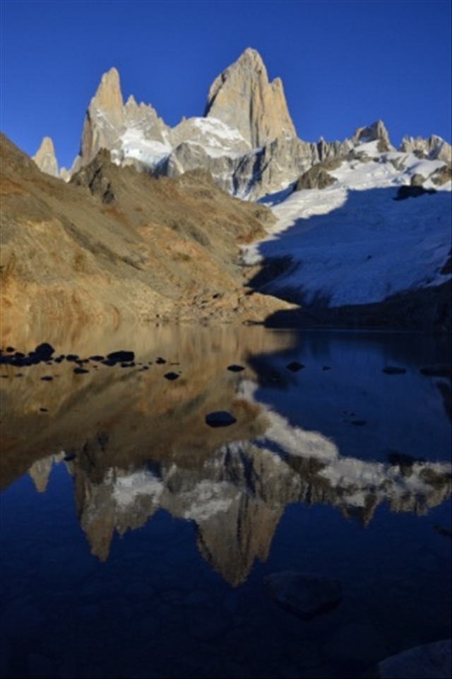 Mount Fitzroy with first morning light and reflection, El Chalten National Park