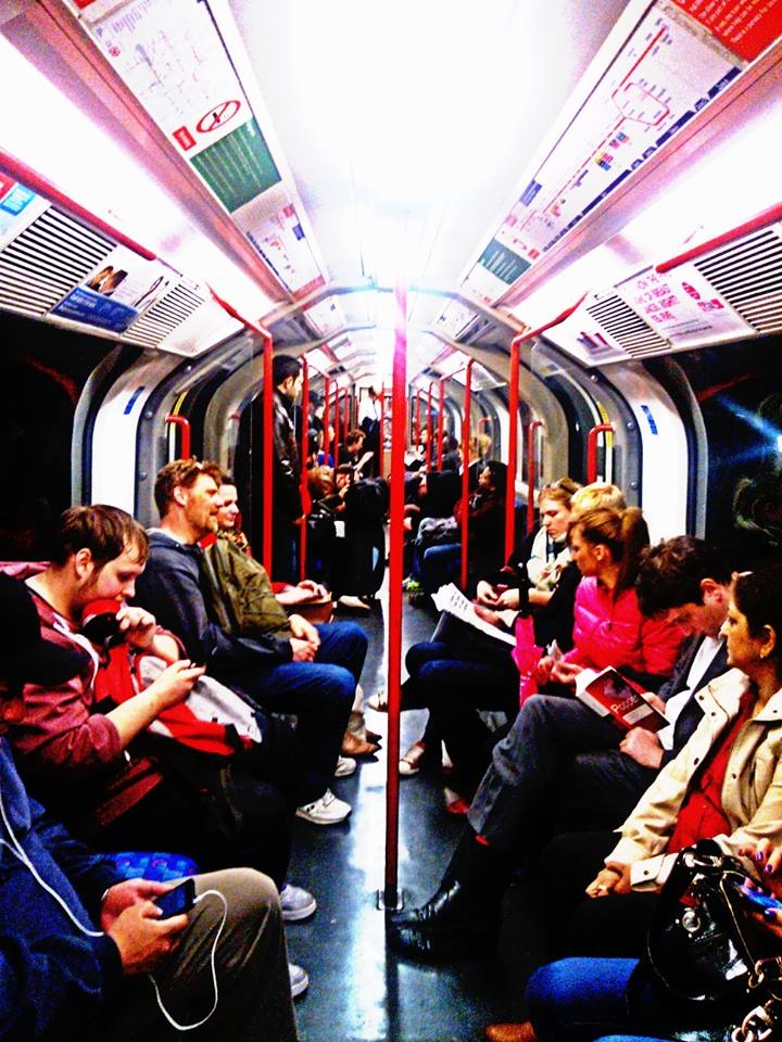 The London Tube - the london tube transports people within the city. The city is a big one. The tube not only blends cultures through the means of people, but also music. If it's not someone taping away to the beats of the song playing through his ear phones, it's the people playing their violins at guitars at the tube stations. Many people think the tube is morbid and mundane. But look closely and observe people...many of them are touritsts, travelers, musicians, business men, students, teachers...a blend of all common professions and passions.