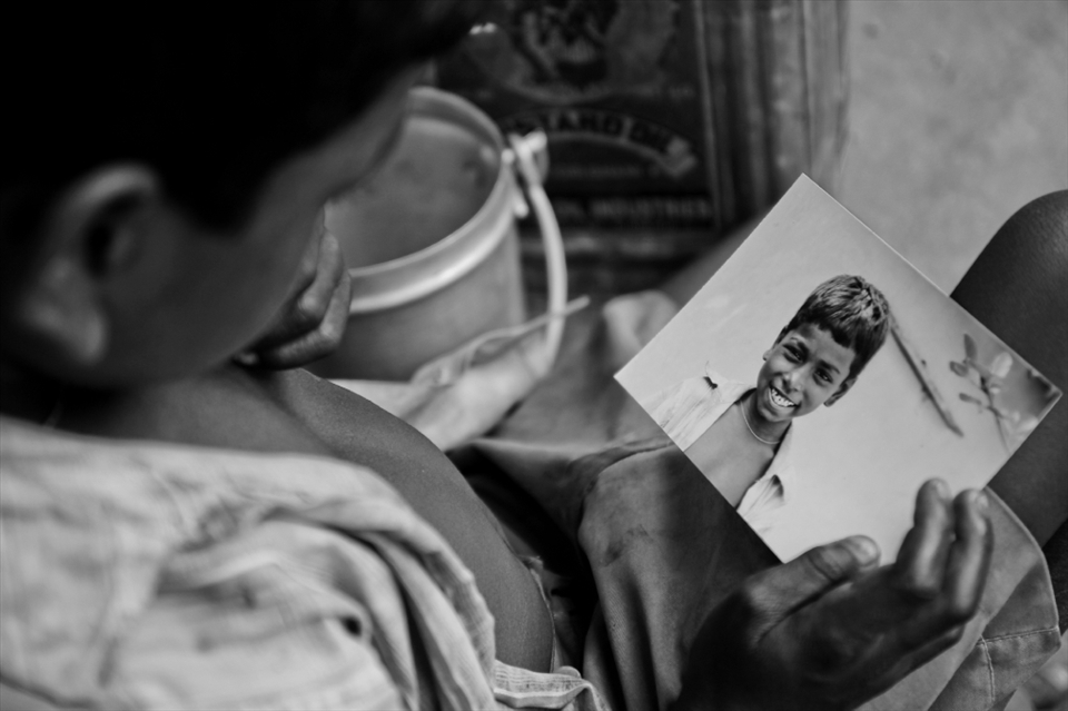 Sujoy in a rare introspective mood while staring at his own photograph. 