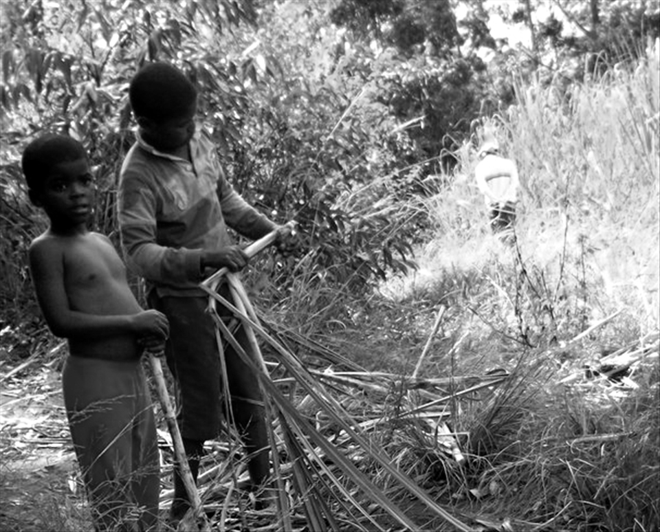 Eating sugarcane with the locals