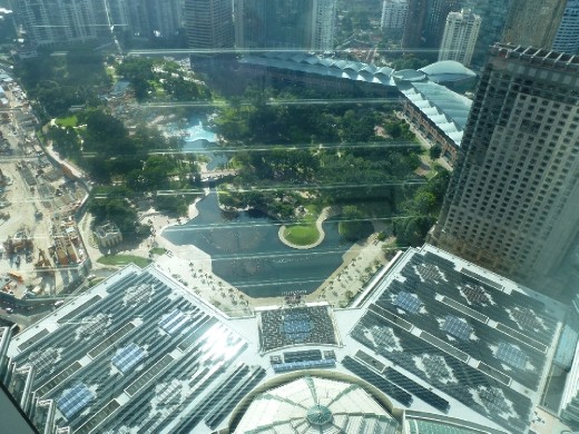 Rooftops below covered in solar panels
