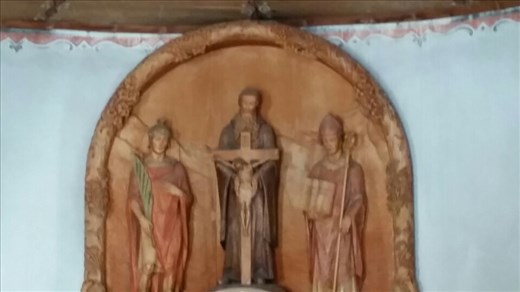 Beautiful wooden carving in the chapel in the snow