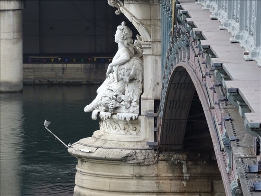 Statue guarding the bridge, Rhone River, Lyon
