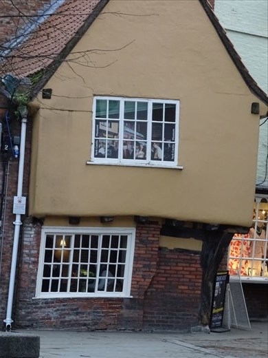 I wonder if there's a crooked man, cat & mouse in this little crooked house...