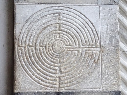 Labyrinth on external wall of Lucca Basilica
