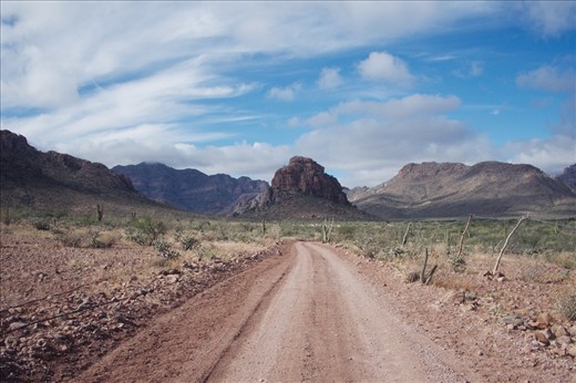 On the road to Palmarito the reality of the Cochimí traveling this landscape by foot from the mountains to the Pacific and the Sea of Cortez is made manifest. What could the lives of the paleoindian painters that preceded the Cochimí have been like? We know that they traveled great distances to procure their pigments; that the act of painting was likely a part of ceremonies enacted to achieve terrestrial goals by supernatural means, dwarfed as they were by this vast landscape.