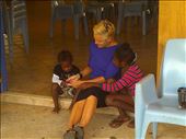 Entertaining the local kids while Court taking place on Badu Island, playing marbles and I phone pictures!: by susiequaid, Views[174]