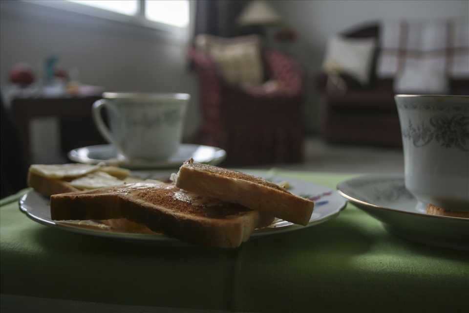 Lillian offered me tea and toast and I offered her an ear for her stories