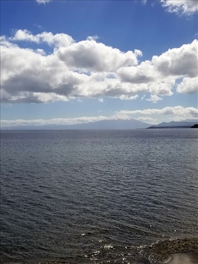 Distant view of volcano across the lake.