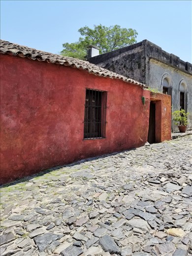 Another brightly colored building. Note how rough the cobblestone streets were. I was glad to have my walking sticks.