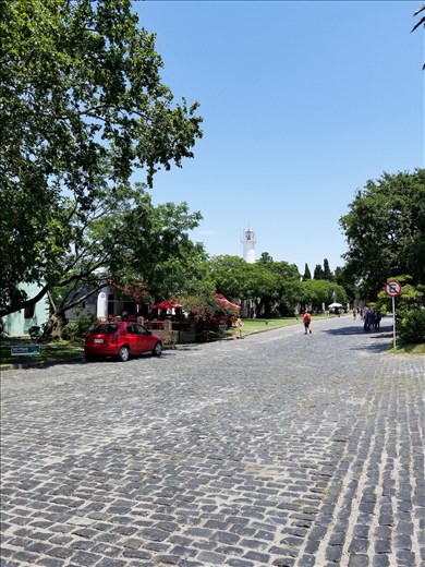 Long view of street and lighthouse.
