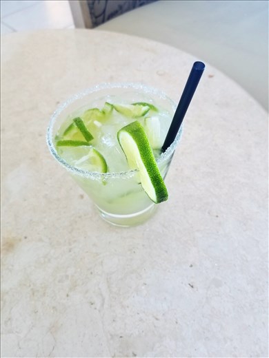 Sweating like a pig after hiking the upper trail, I came back to the bar of the hotel for a drink my brother Phil likes -- a caipirinha. Much better than the one I made.