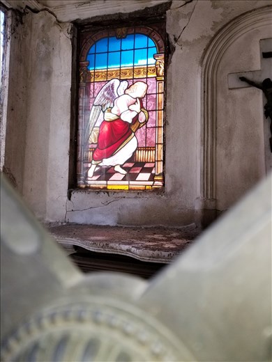 Another stained glass tomb.