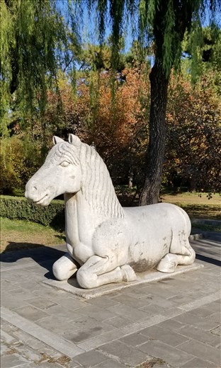 The standing horse was on one side of the walkway and the same animal was lying down on the other side. It's said that this one was off duty and they switch positions at midnight. We didn't stay to see if it's true!