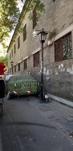 Here is an example of an alleyway in Old Town. I wasn't enamored with the area. It was ugly and smelled terrible.
But, it's the only area of China where people actually own where they live. They must pass it down to a family member or it reverts to the government. These places go for about $1000/square foot!!!