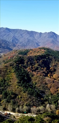 Another view of the rugged landscape. And, because the wall was built by different groups at different times, there are many breaks in it. The Chinese call it the long wall and some say it was renamed to encourage tourism.