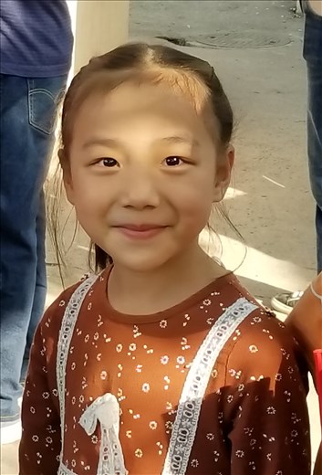 This little girl also performed with her classmates. Every where we went the kids were very interested in us.