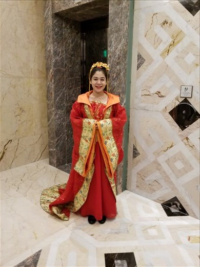 We stayed at the Kerry hotel in Beijing. This lovely woman was calling the elevator for us. Our guide told us there was a big toy in our room and he'd see how many of us knew what it was. It turned out to be a toilet the had a seat warmer, water to clean all parts, rotating backs, etc. Quite amazing.