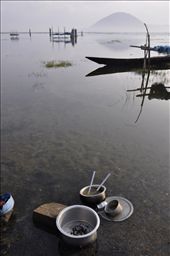 The utensils were there for washing. Fishermen, who lived by the side of the lake, they come to wash their domestic utensils after meal...: by swarupsphoto, Views[652]