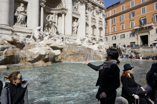 Throwing a coin in Trevi Fountain!