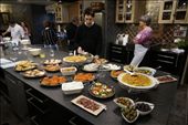 The whole spread, with Gregory making final touches. Isn't the kitchen amazing?: by swinginggirl, Views[357]