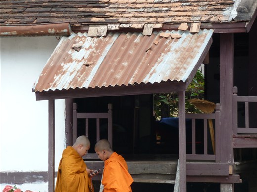 Kids will be kids. Teenage monks sharing their love of music