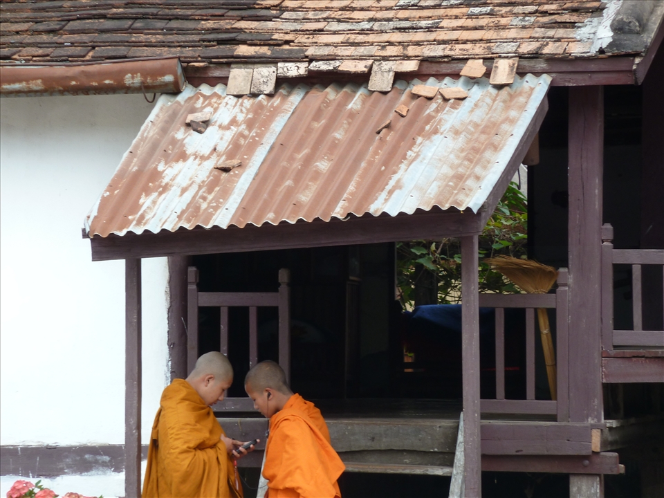 Kids will be kids. Teenage monks sharing their love of music